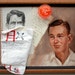 A book and a painting. "Bob N. Frapples"  11"x14" framed oil and mixed media Kenney Mencher with signed book.