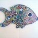 Big Eyed Fish on wood