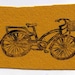 mustard colored heavy wool blend felt patch with gocco designed vintage bicycle bike