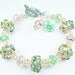 Lampwork glass bracelet - flowers, green, pink, gold