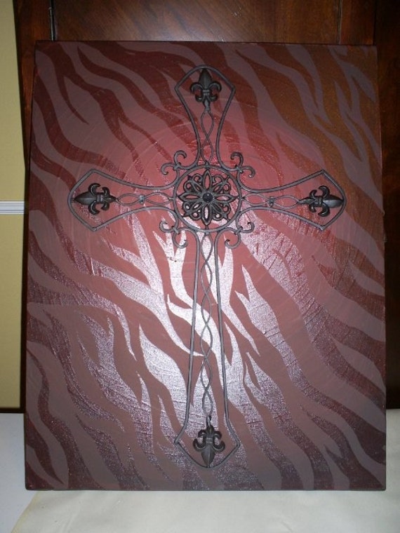 Metal art mounted on painted canvas