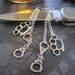 Brass Knuckle and Handcuff Dangle Earrings