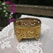 Oval Filigree Jewelry Box With Glass Lid