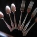 7 Antique Spoons Forks in Various Desigins Rogers Oneida