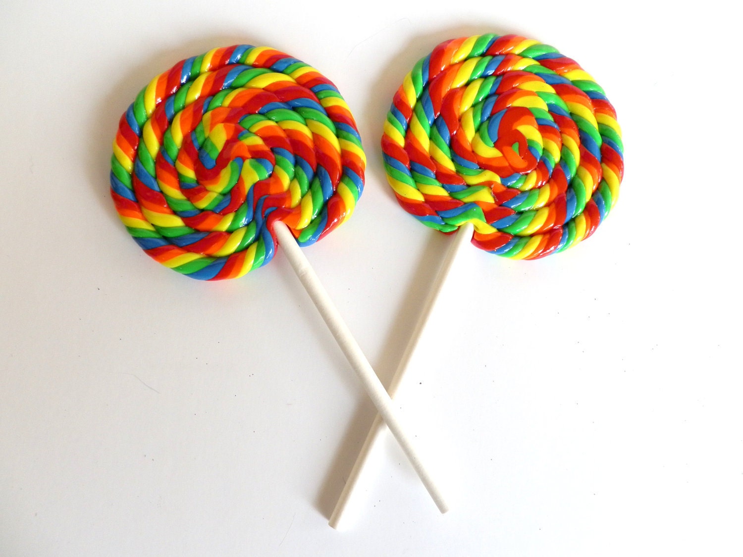 Lollipops 2 Big Rainbow Swirl Clay Lollipops.