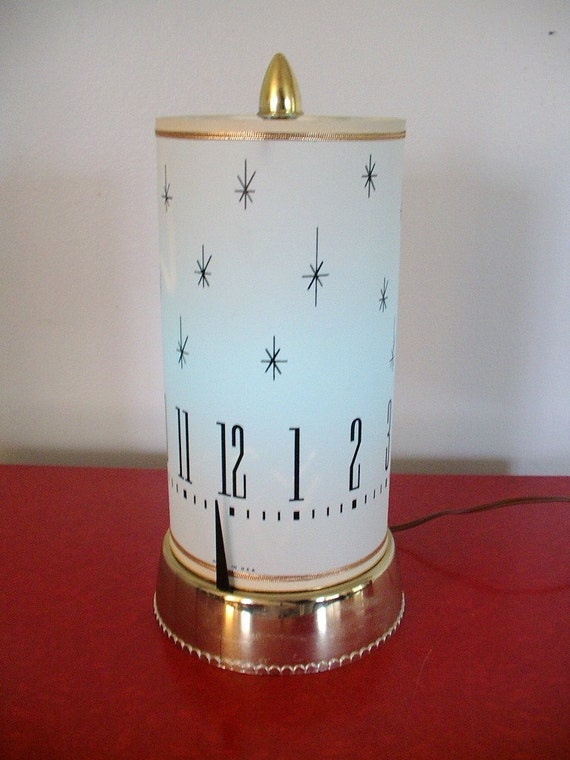 mid century SPARTUS 1960s revolving TV Lamp Clock