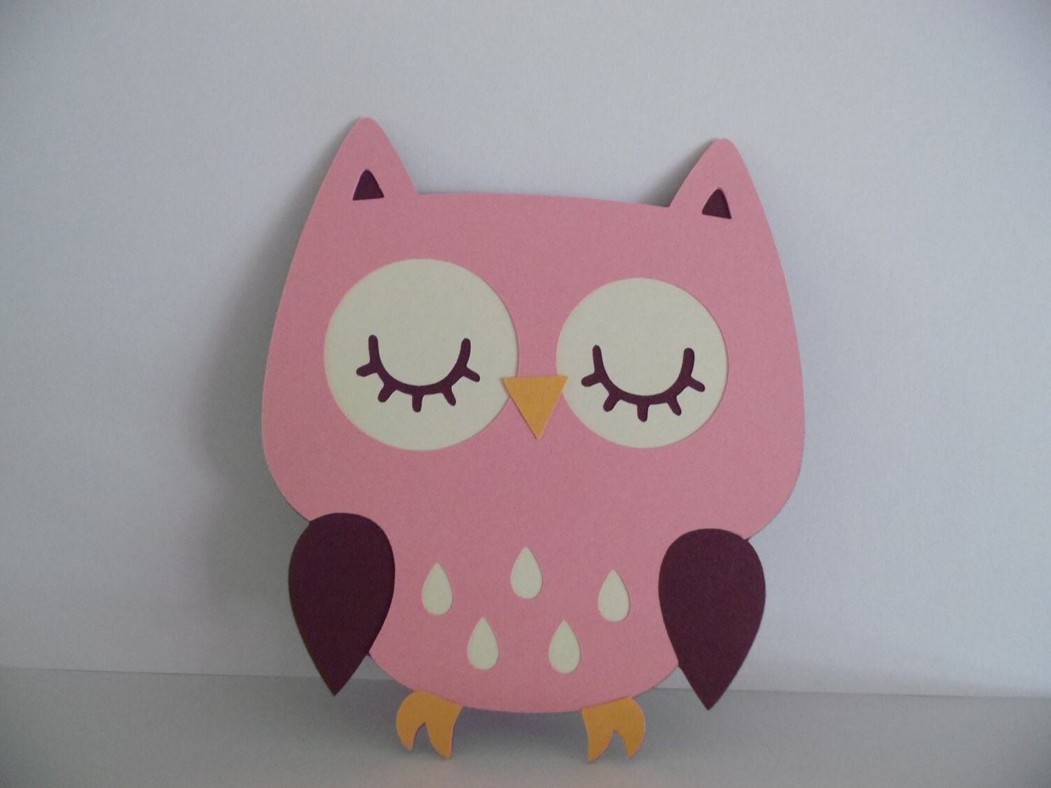two paper owl cutouts perfect for scrapbooking