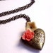 Hearth locked pendant