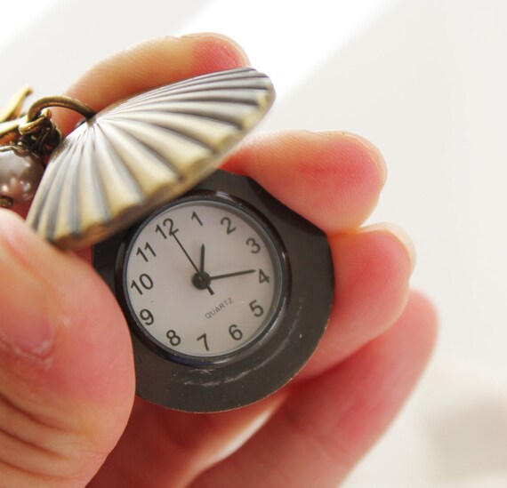 silver seashell watch