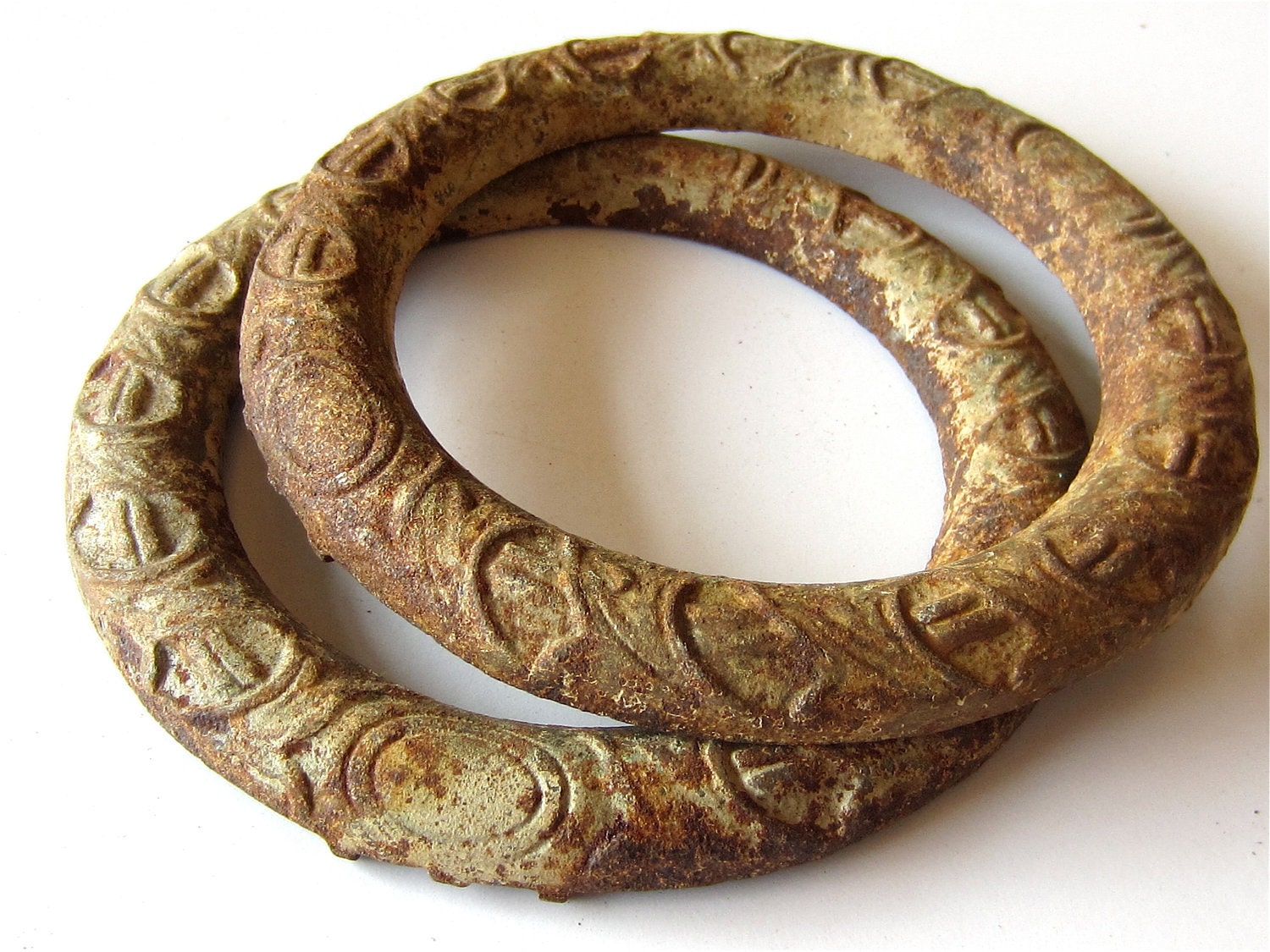 2 old ornate heavy rusty cast iron rings by TheBlindPeacock