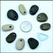 Drilled Beach Stones 9 beads and one sea glass top drilled