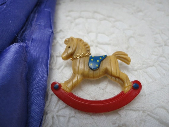 vintage plastic rocking horse