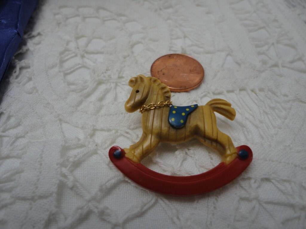 vintage plastic rocking horse