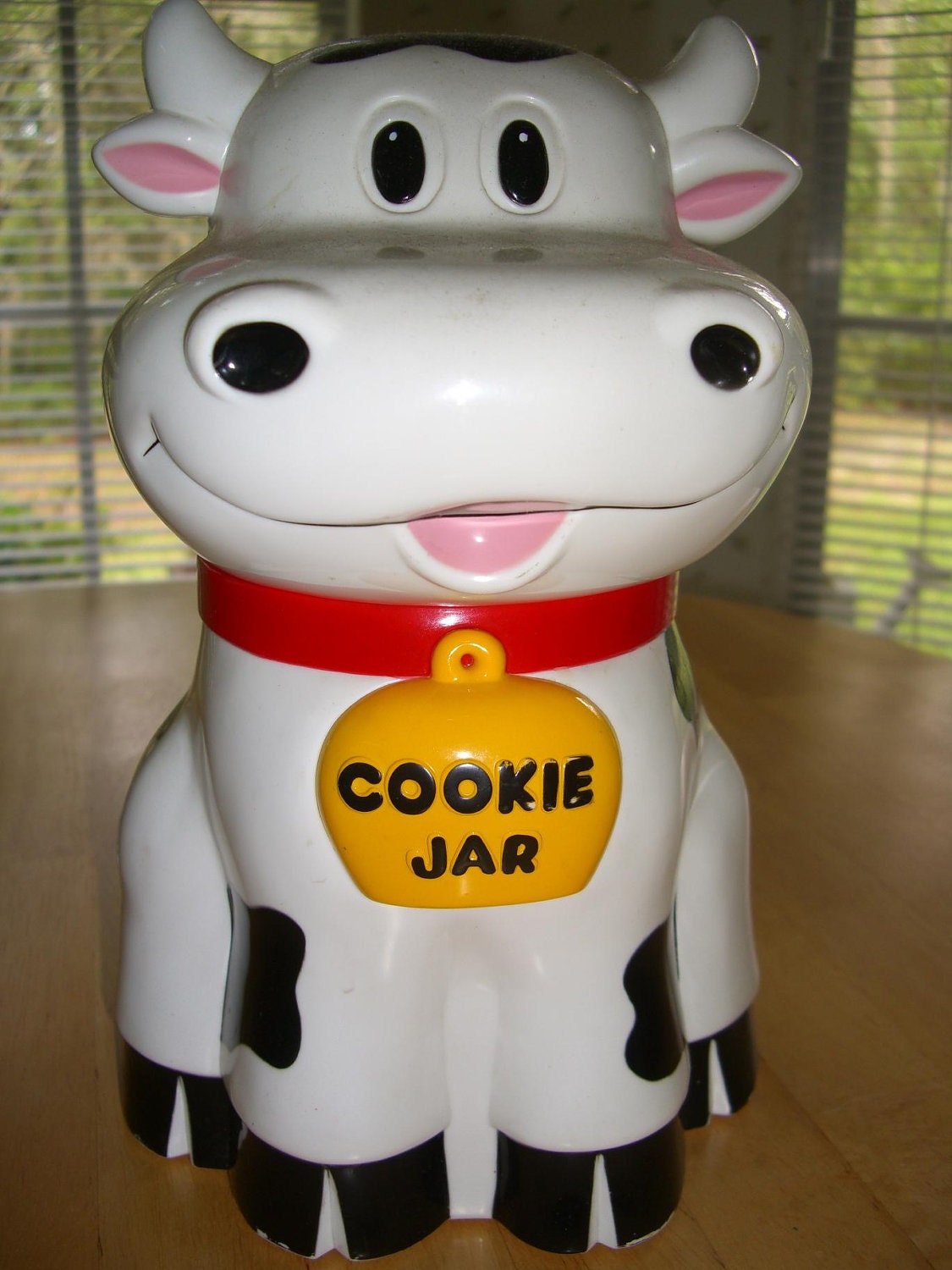 Vintage cow cookie jar that moos