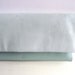 Foldover leather & suede clutch bag, in pastel baby blue