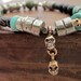 Skull Bracelet with Turquoise, Pyrite, Jade, Sterling Silver and Bronze nugget beads