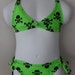 Lime green girl bikini skulls and cross bones