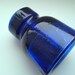Deep cobalt blue old insulator hallmarked "II"