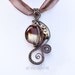Silver and amber brown steampunk wire wrapped pendant