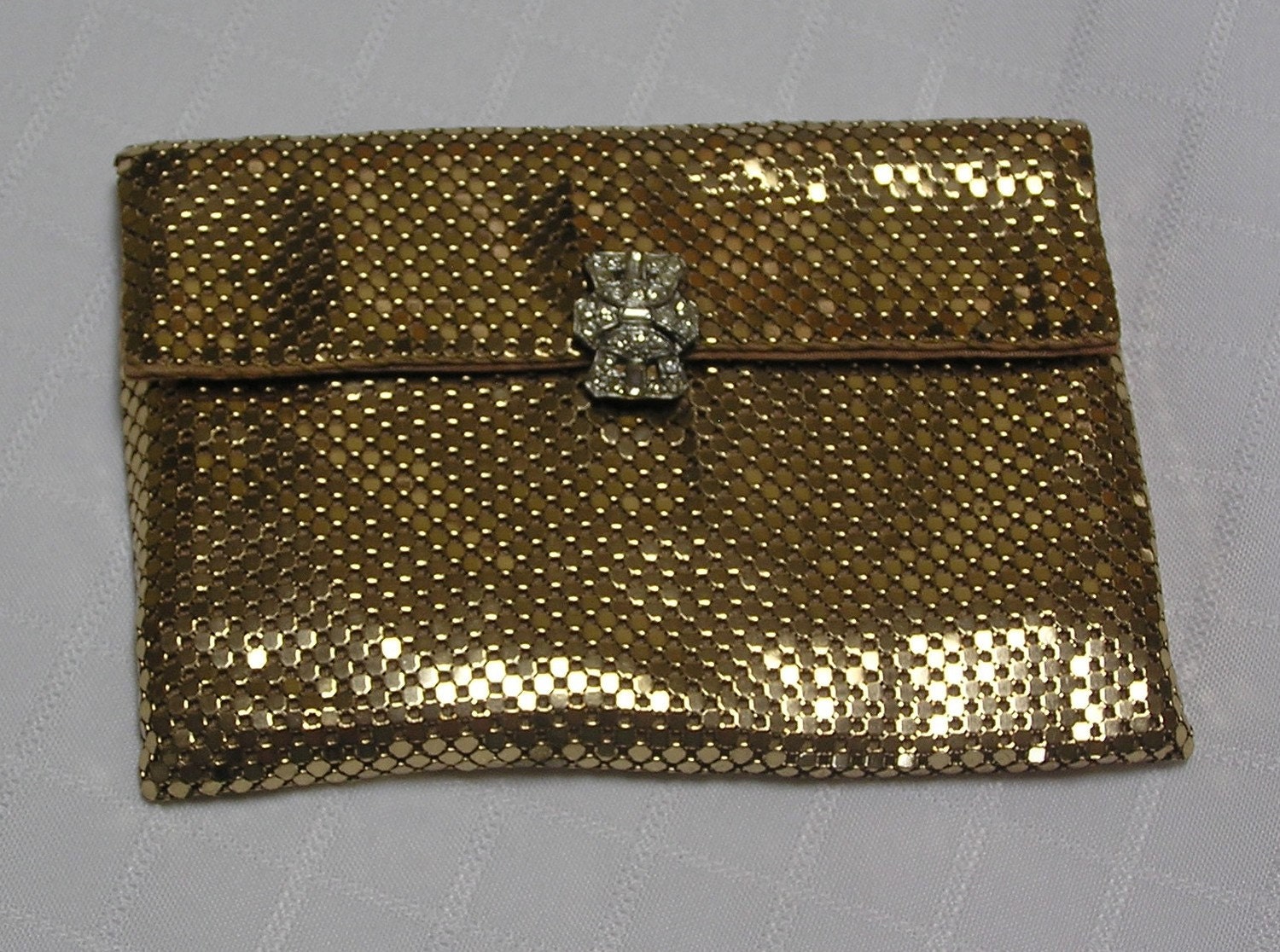 whiting and davis gold clutch