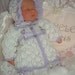 Pretty knitting pattern to fit 16 inch - 20 dolls or prem baby