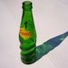 Green Glass Soda Pop Bottle. Read the description for creative gift ideas. Vintage 10 oz Twisted Squirt