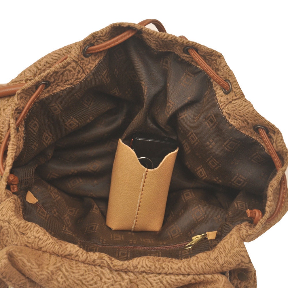 Handmade backpack in patterned heavy cotton with leather