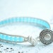 Sea glass Bracelet-- Single wrap white leather bracelet with sea blue and metal button closure