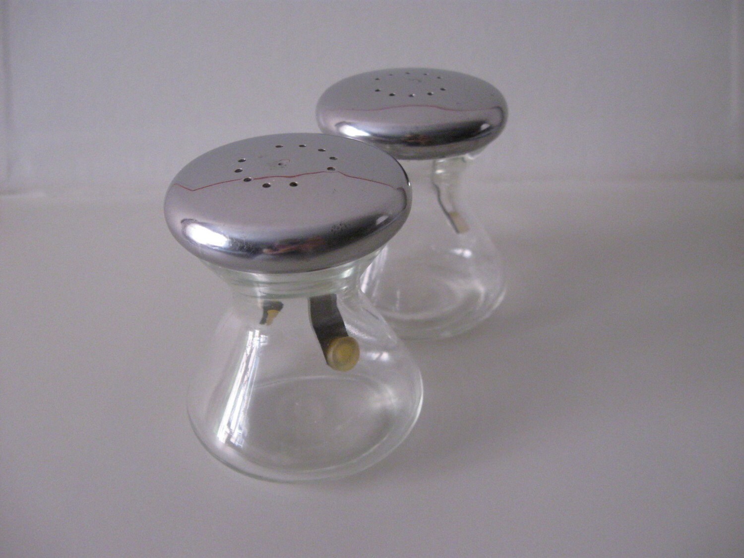 Salt and Pepper shakers. Midcentury modern. Faux WMF. FREE