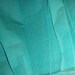 Cotton fabric by the yard in Teal (weft) and Old Green (warp). Dusty style.