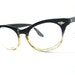 SALE black to clear fade cat eye glasses. silver accents. SRO 46-20.