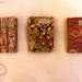 RESERVED FOR VICTORIA Groupe of three antique miniature french booklets covered with fabric