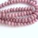 1/2 strand Rhodonite rondelle beads (6x4mm)