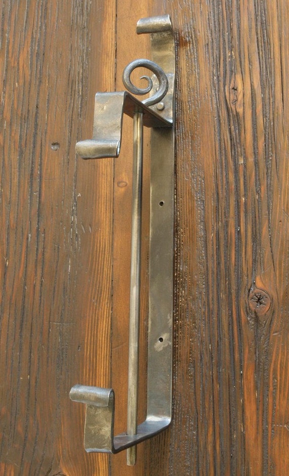 Wall Mounted Iron Paper Towel Holder. Hand by a