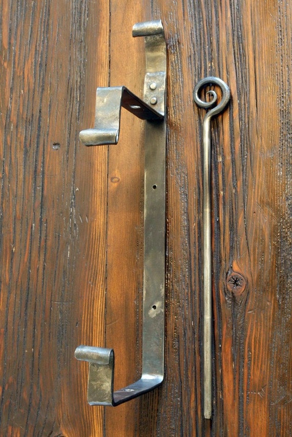 Wall Mounted Iron Paper Towel Holder. Hand by a