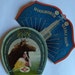 Vintage paper needle cases with great graphics and some needles