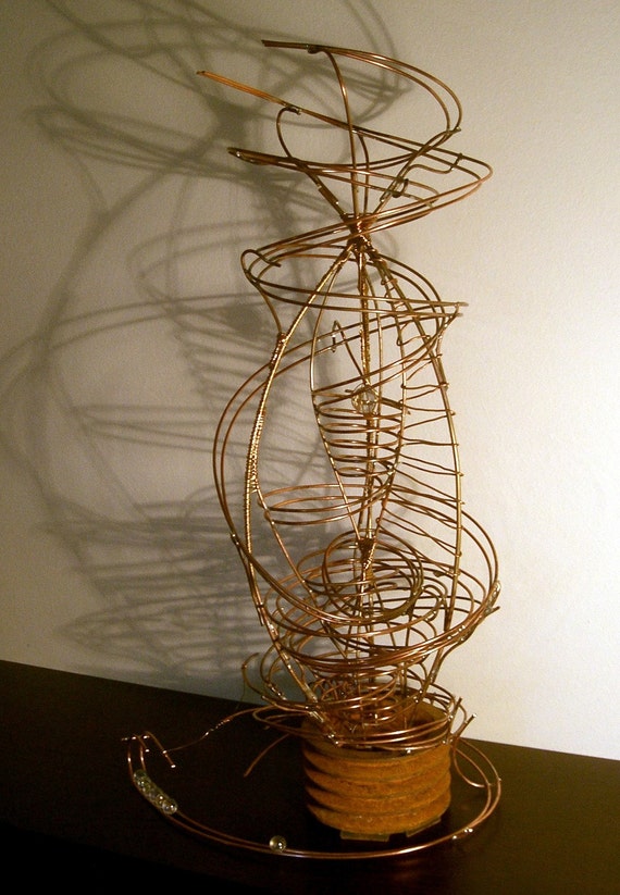 Unique rolling ball copper sculpture