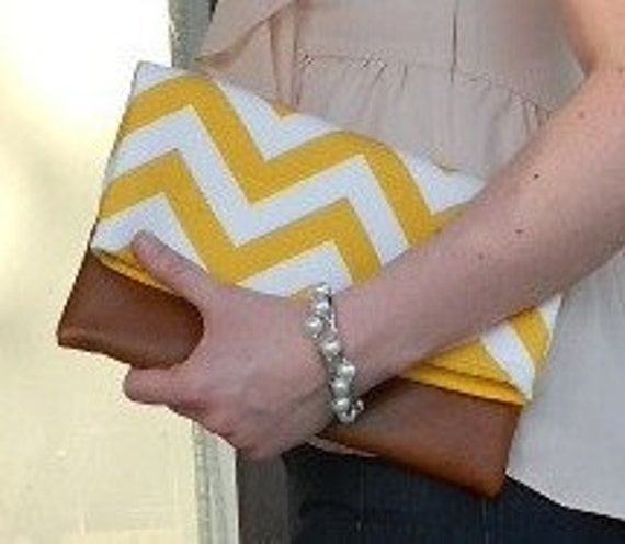 yellow and white clutch