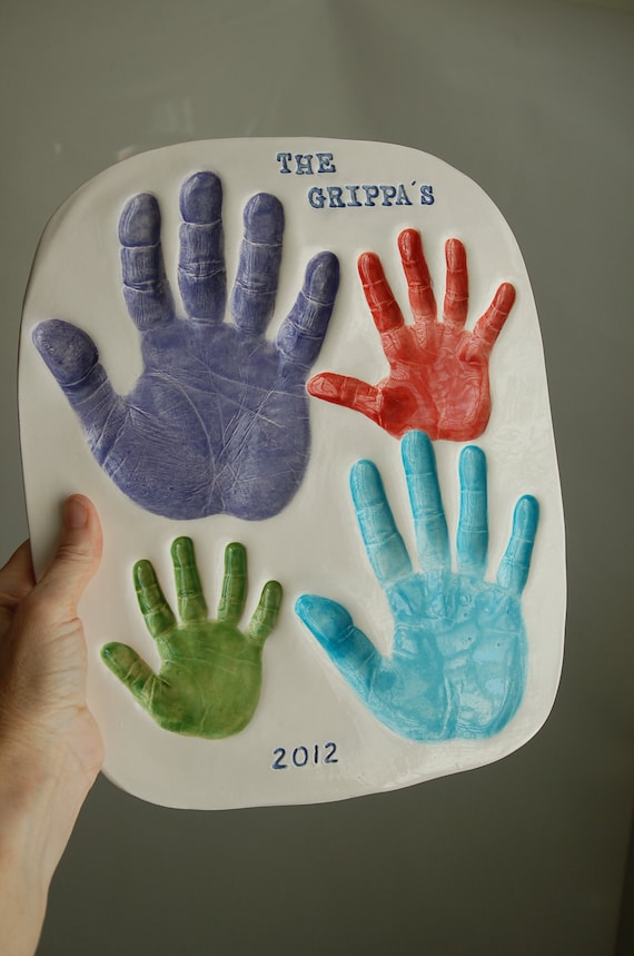 Items similar to Hand prints of the family with four hands and includes