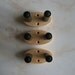 Plain ukulele wall mount hangers, three pack.