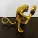 Brass Monkey Holding a Mirror, Desk Ornament or Paperweight