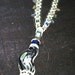 Melt Your Face Mushroom Stealie Hemp Necklace with color changing mood beads, glass mushroom beads, and gemstone chip beads