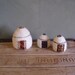 Felted yurts, set of 3 small embroidered wool sculptures