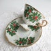 Lovely Pedestal Gold Christmas Floral Holly High Tea Cup and Saucer Red Green