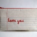 Reserved for Hannah. Lined Paper Fabric (on both sides), Hand Embroidered Name. Personalized Pencil Pouch, Pencil Case.
