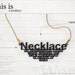 Word charm / Necklace in black
