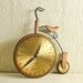 Large vintage bicycle wall clock made by Masketeers, 1963