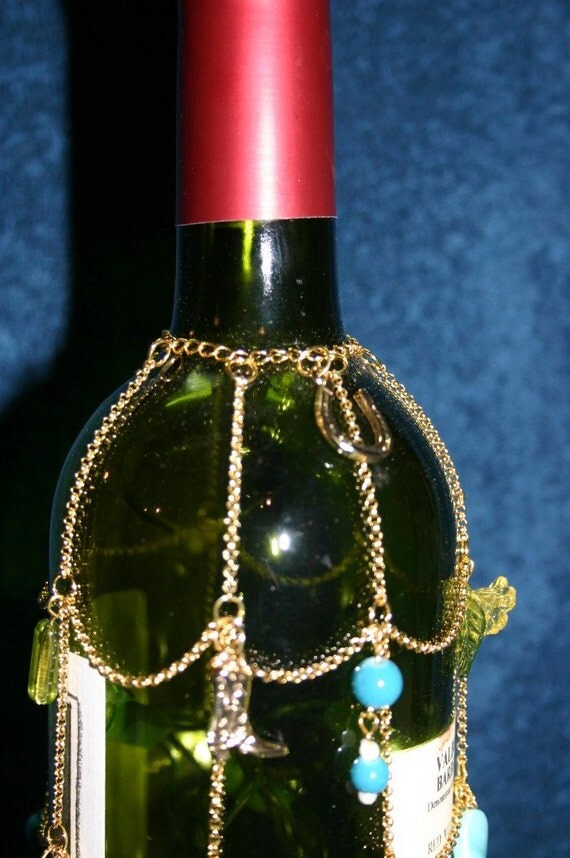 lighted wine bottle with gold decorative by BirgittasDesigns