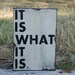 Wooden sign It is what it is sign made from reclaimed plywood
