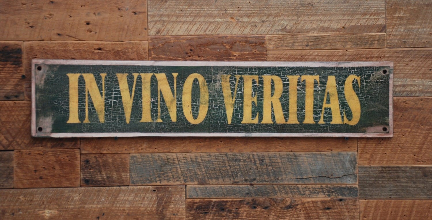 IN VINO VERITAS sign made from reclaimed plywood